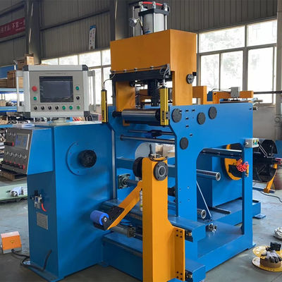 Machine à souder sous pression à froid pour les transformateurs à enroulement de feuilles de cuivre à basse tension
